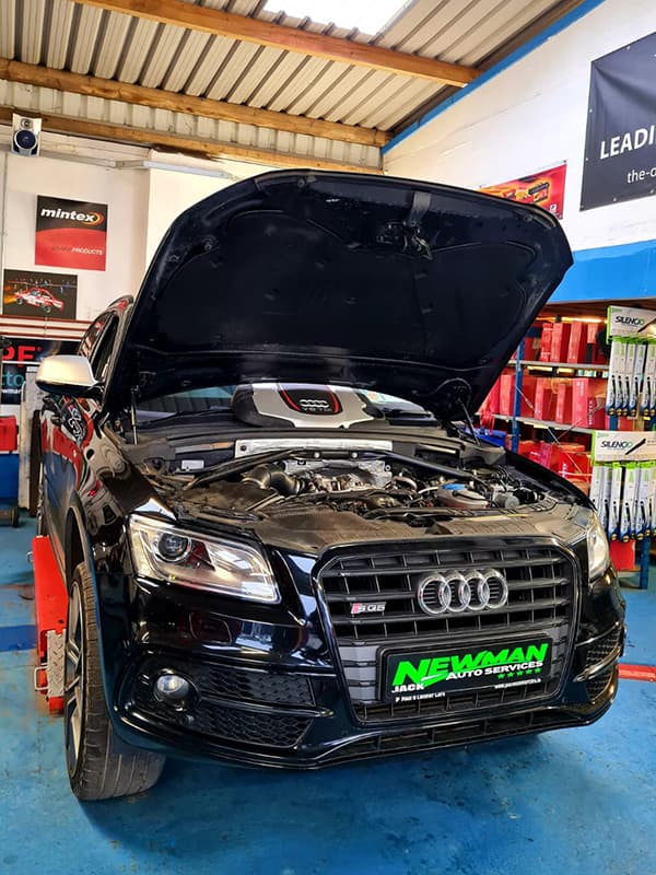 On the ramp in Jack Newman Auto Services, an impressive black Audi Q5